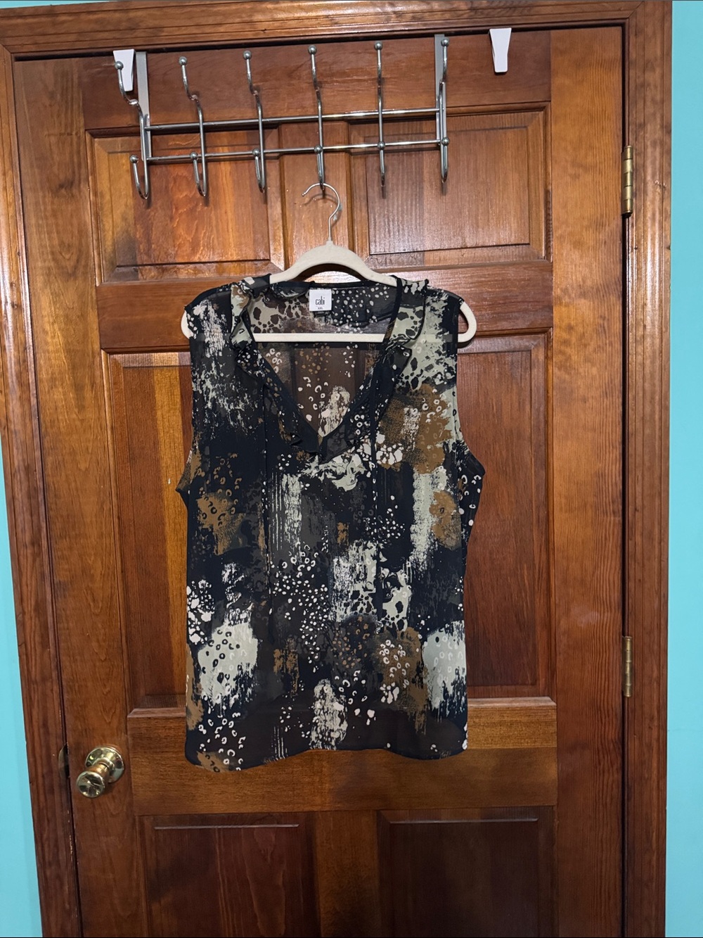 CAbi Sleeveless V-Neck Blouse in Black, Brown, and Cream Abstract Print